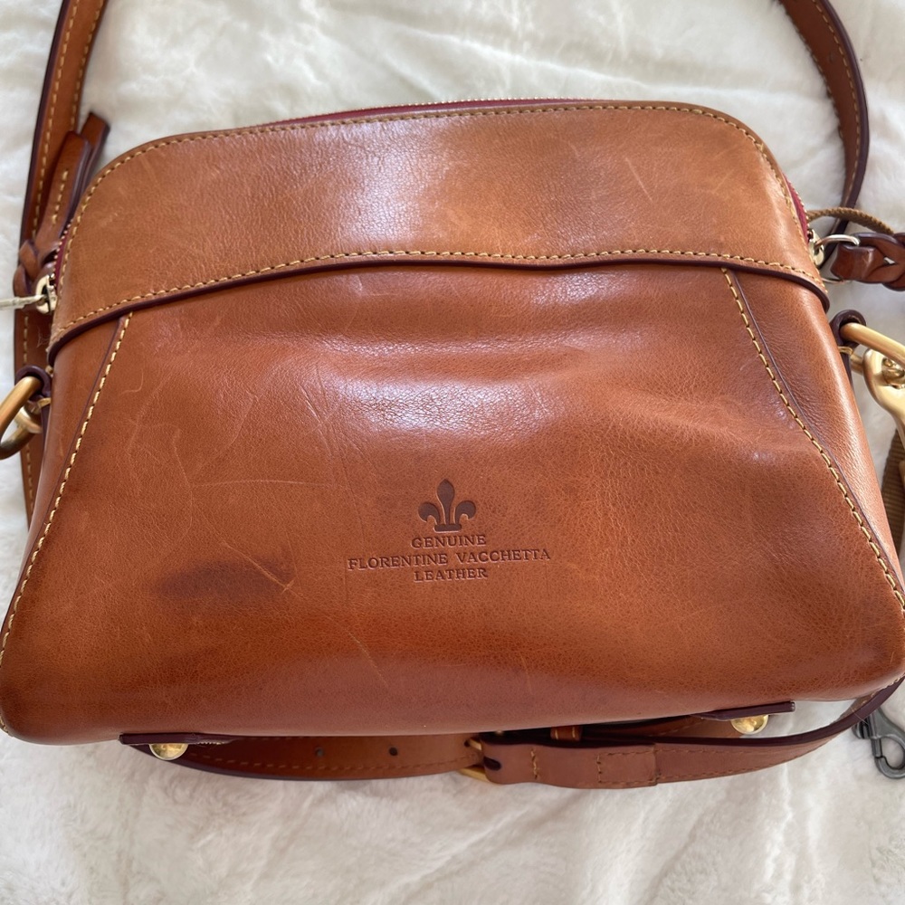 bite-sized crossbody, made from Italian Vacchetta leather